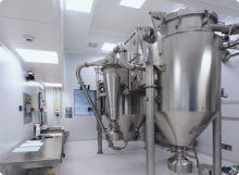 A manufacturing clean room with a GEA pharmaceutical spray drying machine (PSD-1).